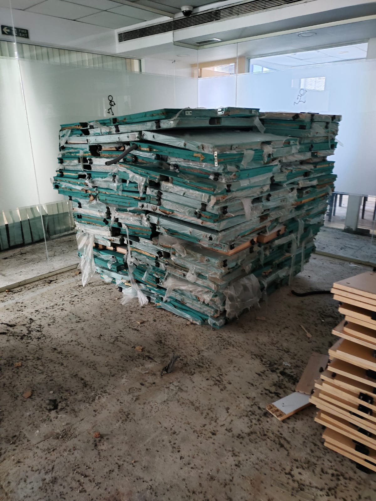 Office Relocation Services in HSR Layout Pile of sorted aluminum and iron frame elements collected during office dismantling services in HSR Layout