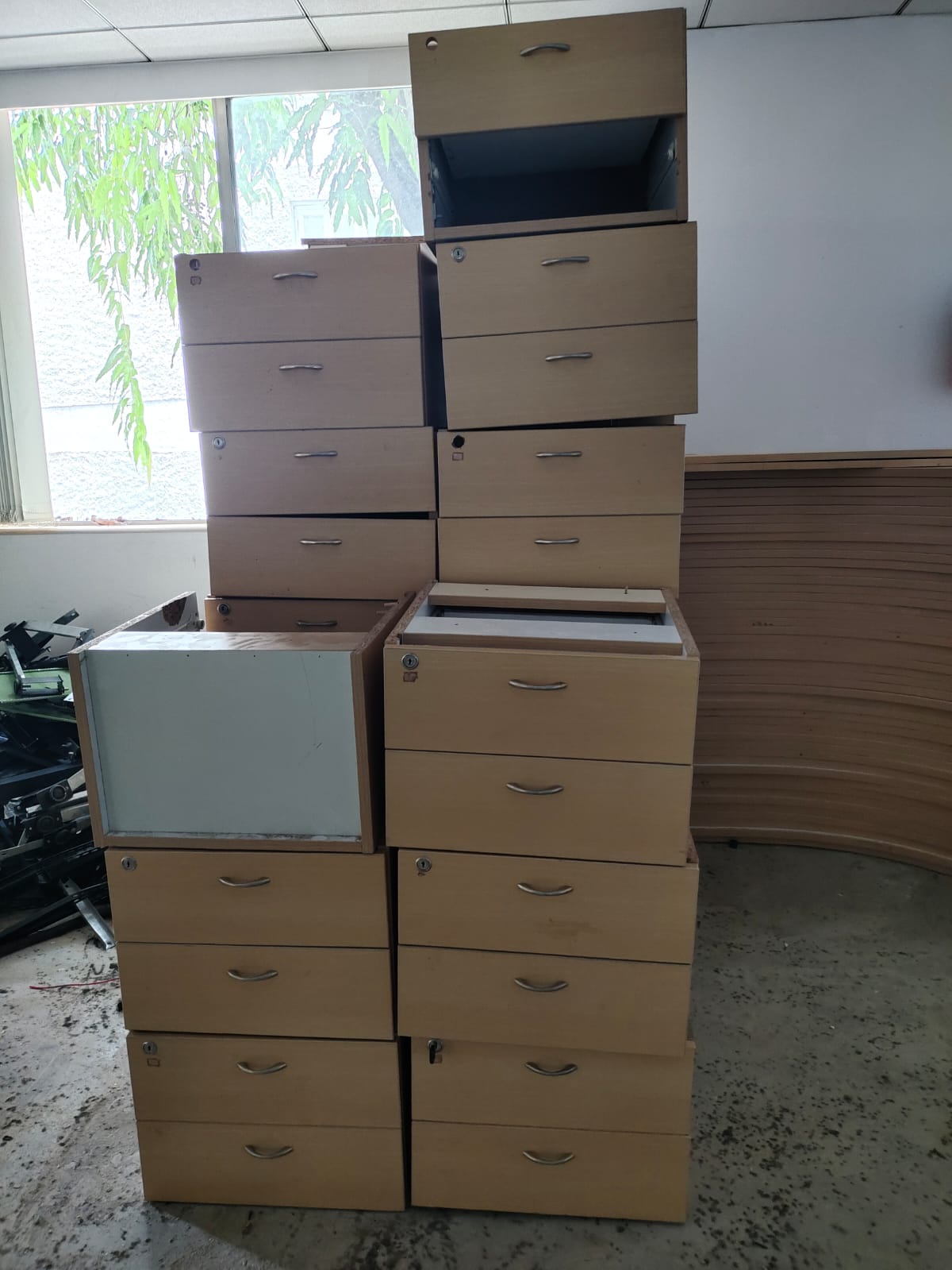 Cubicle Panel Breakdown | Office Furniture Dismantling HSR Layout Wooden worktops and modular cubicle partitions flat-packed during a professional office furniture dismantling HSR Layout project.