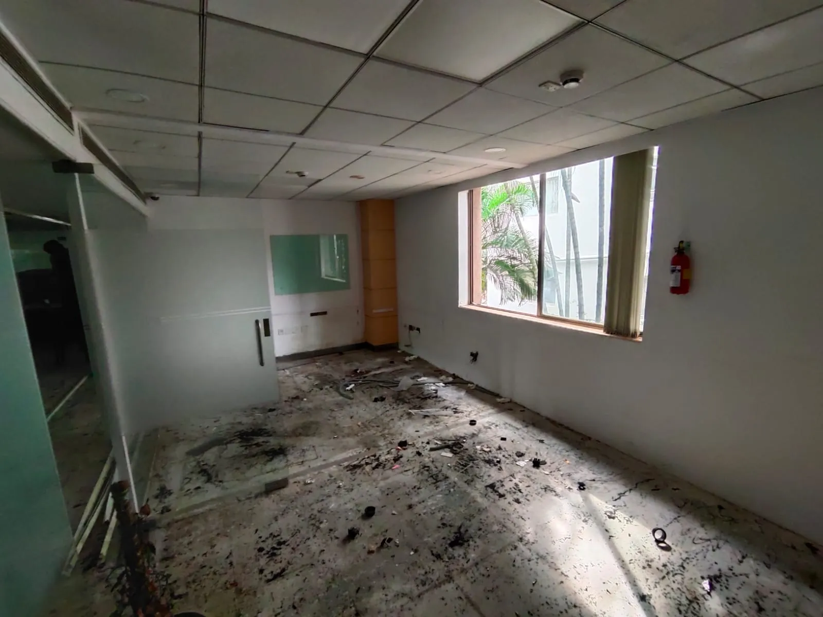 Acoustic Divider Staging | Office Partition Removal HSR Layout Protective wrapped stacks of fabric acoustics and partition divider boards optimized for office partition removal HSR Layout